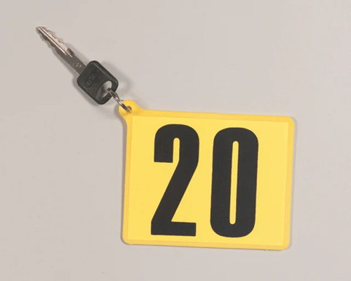 Plastic key paddles with identification decals and key rings