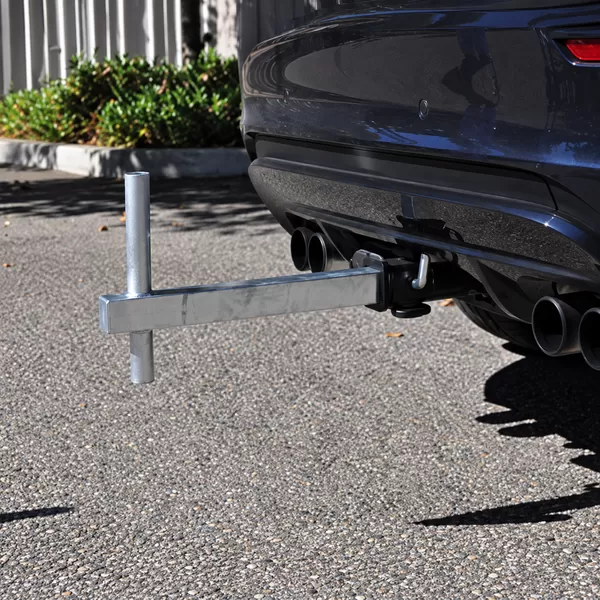 Tow hitch flagpole holder for a two-inch vehicle receiver